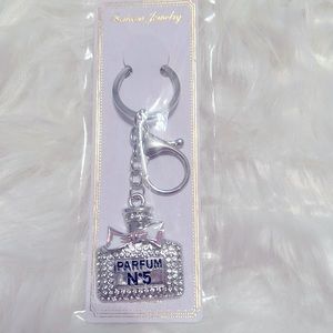 NWOT Silver toned Parfumerie No 5 Key/ Bag Charm